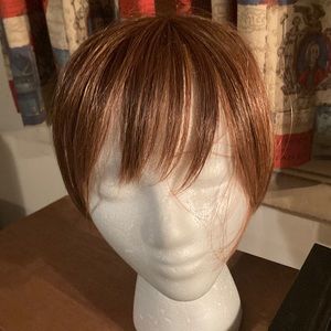 Synthetic golden brown hair topper by Hairdo